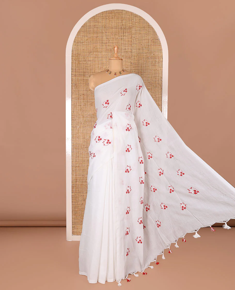 Borderless white and red floral motifs embroidered Khadi mul cotton saree with a matching plain blouse