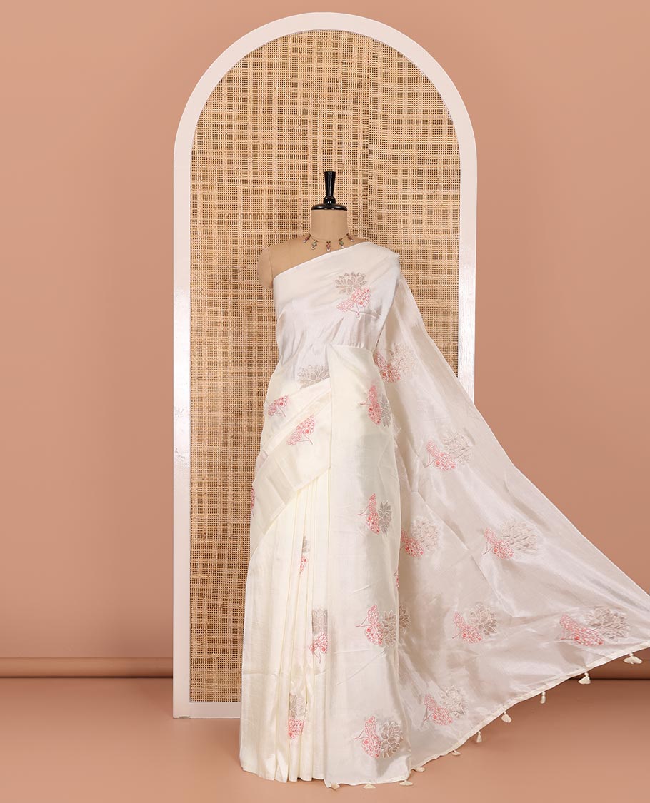 Borderless white floral motifs embroidered fancy tussar saree, floral motifs embroidered pallu, and a plain blouse