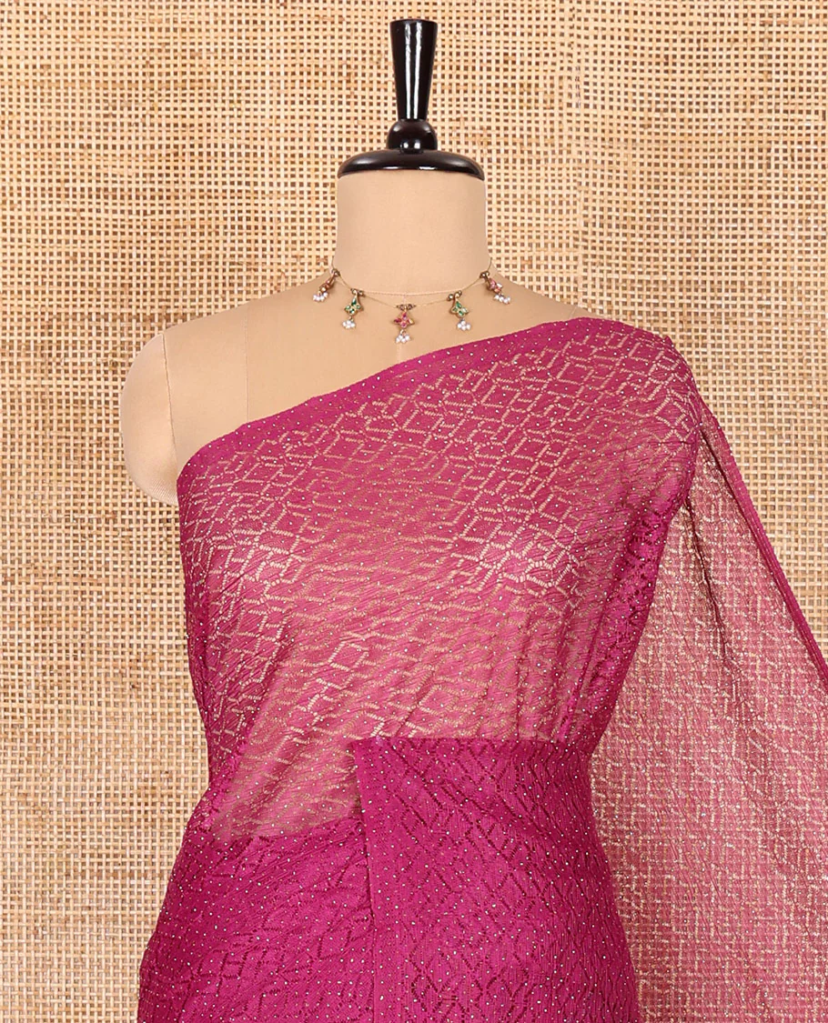 Borderless wine sparkling glitter russel net saree with self-pallu, and a contrast floral printed and zig-zag patterned blouse - Image 2