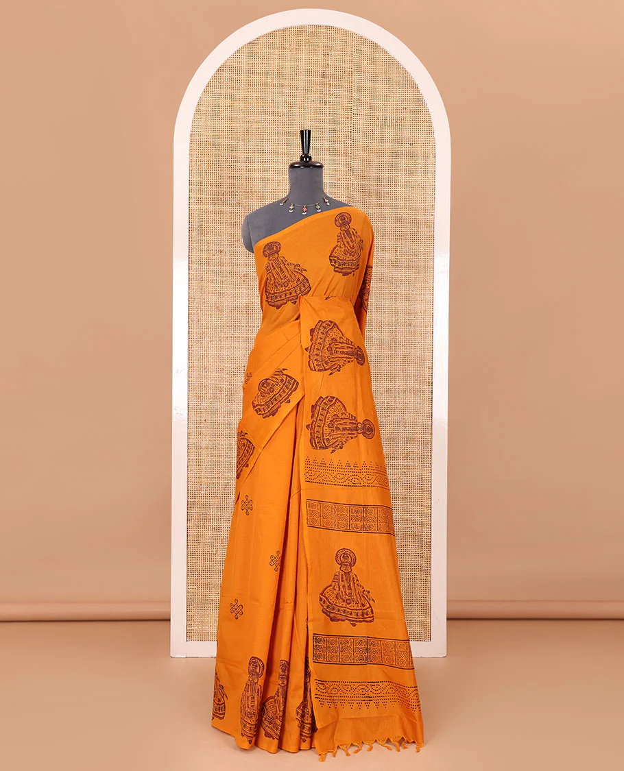 Borderless yellow kolam and kathakali motifs printed South cotton saree with a matching blouse, and a contrast floral vine printed blouse - Image 2
