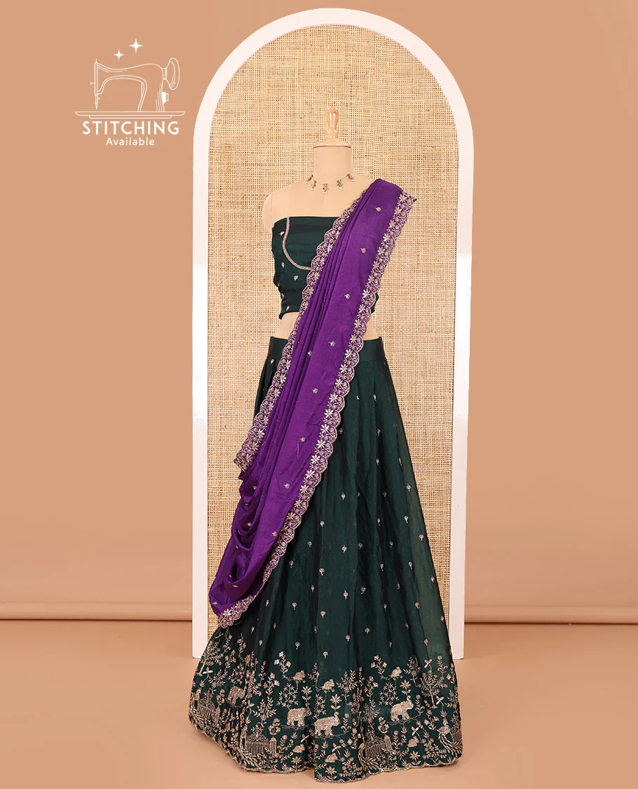 Bottle green half-saree, buttas and flora-fauna embroidered bordered velvet organza skirt, a matching velvet organza blouse, and a contrast embroidered scallop syska georgette dhavani - Image 3