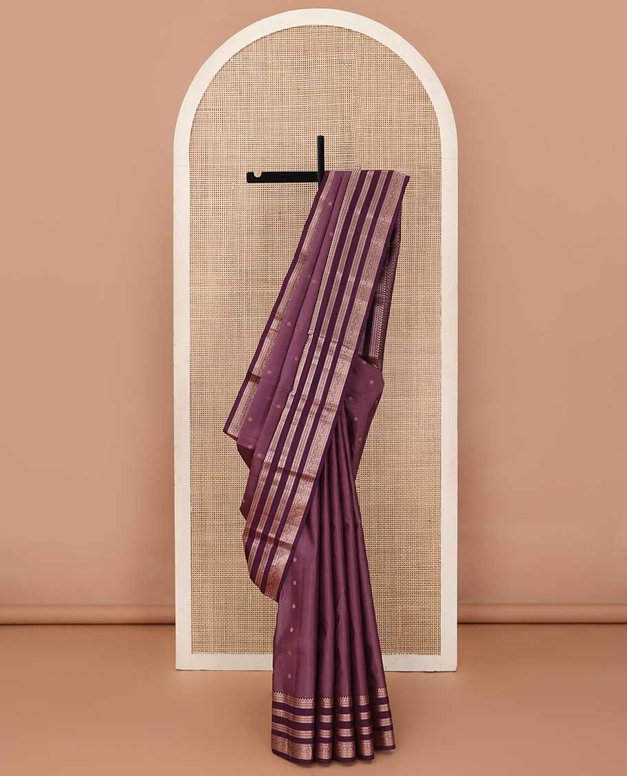 Brown Vasundhara silk saree with zari buttas, contrast border of manga, muthu, banaras, diamonds, and zari designs, and jaal pallu