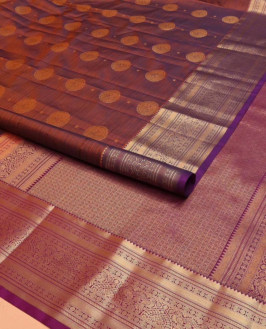 Brown Vasundhara Lite Silk Mix Saree Beautified with Chakram Zari Buttas, Complemented with a Contrast Border Featuring Rekku, Muthu, Kathir, Kamalam, and Mayil Designs, Pallu Elevated with Jaal Designs, and Paired with a Contrast Blouse - Image 2