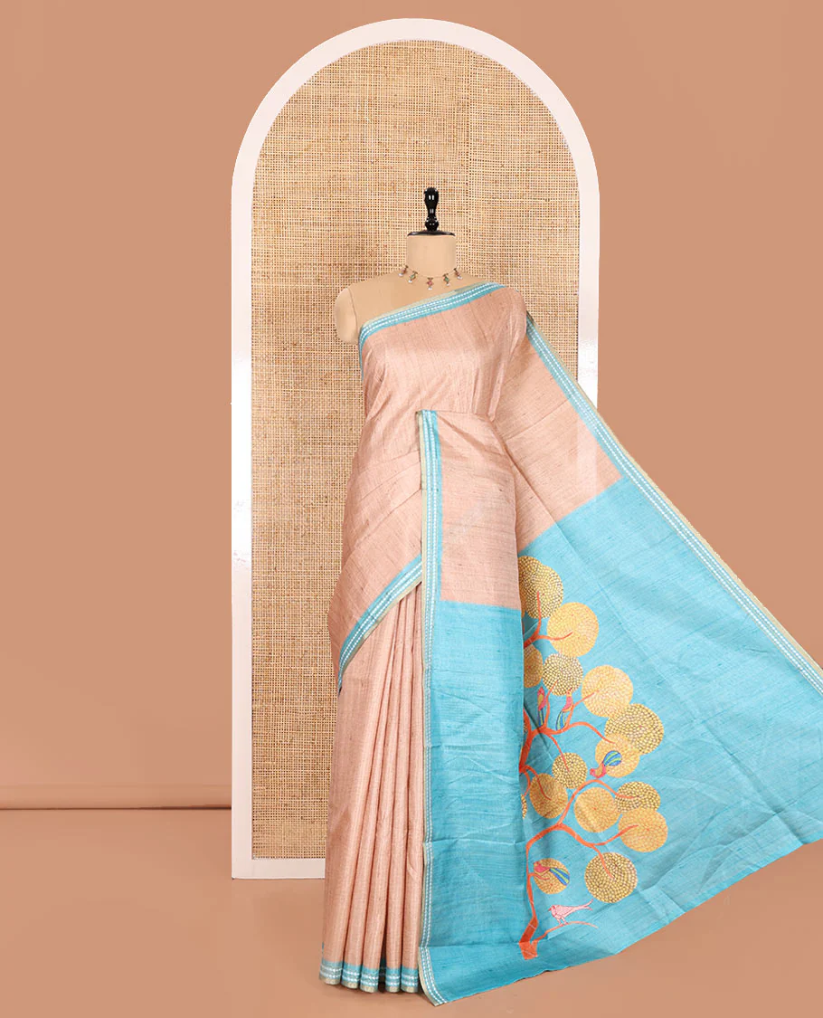 Chikku and Blue Plain Semi-Tussar Saree, Complemented by a Contrast Resham Thread Border, Tree of Life Printed Pallu, and Paired with a Contrast Bird Motifs Printed Blouse