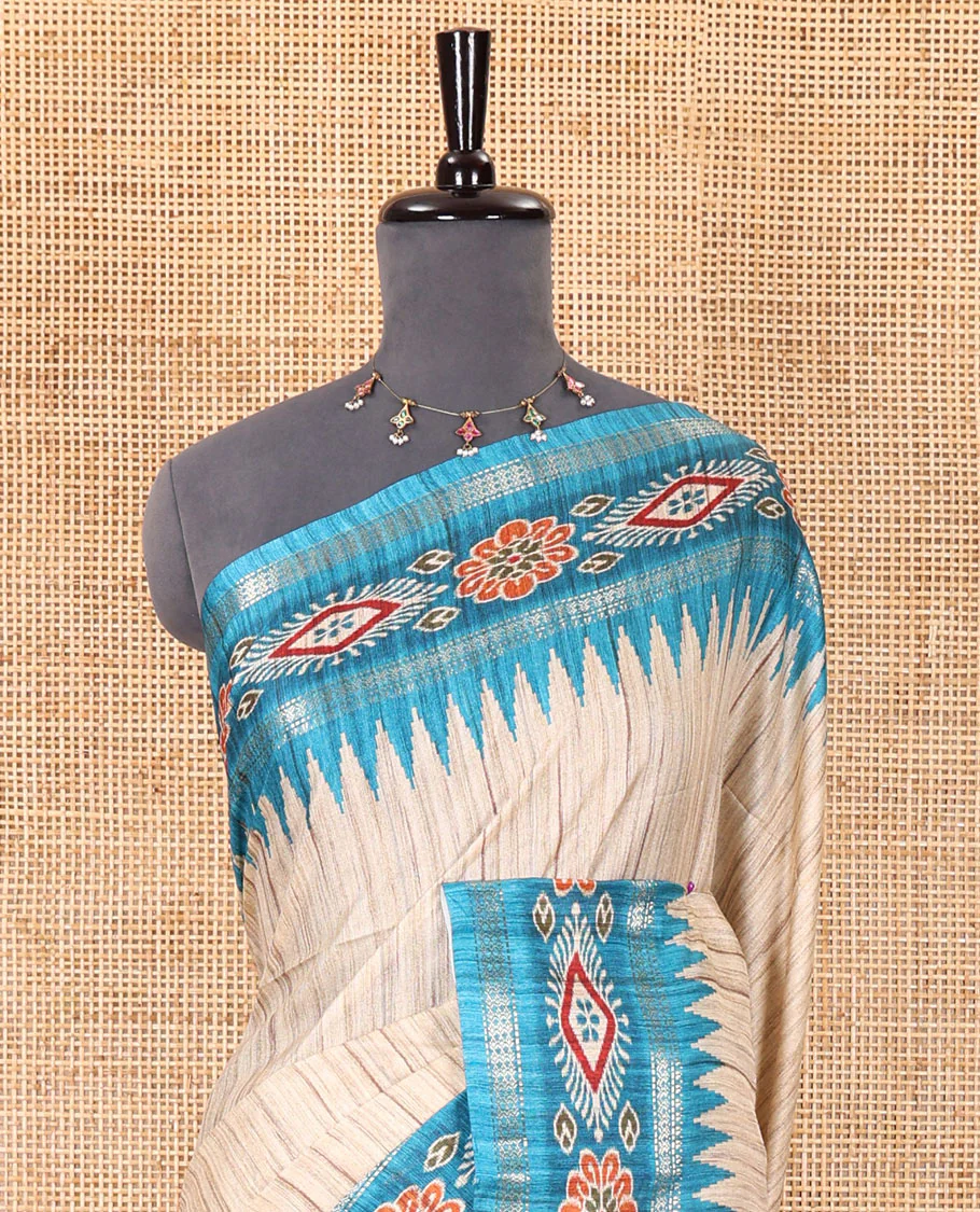 Chikku- blue plain Katan silk saree, contrast ikkat floral-geometric printed temple border, ikkat printed pallu, and ikkat printed blouse - Image 3