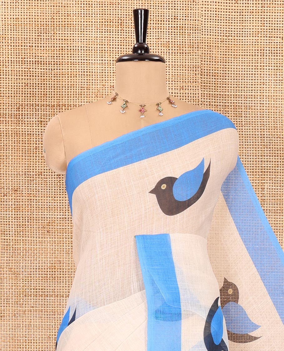 Chikku colur birds motifs linen cotton saree with contrast plain border , birds mofits pallu and leaf printed blouse - Image 2