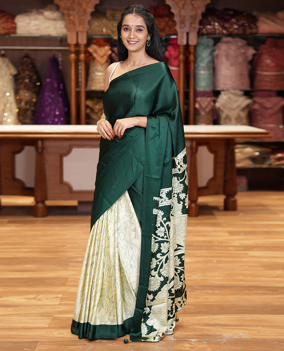Chikku-green half-and-half plain and kalamkari floral printed satin crepe saree, plain border, pallu of floral vine and peacock printed, and kalamkari floral printed blouse
