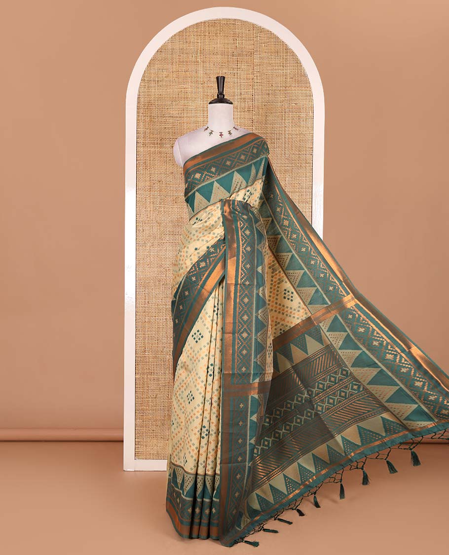 Chikku ikkat style zari and thread buttas elite soft silk saree, contrast ikkat design border, geometric patterned pallu, and a contrast blouse
