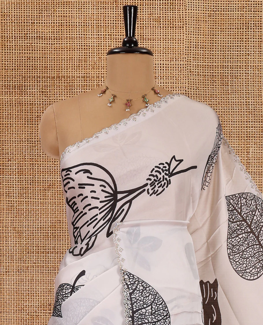 Cream and black floral, butterflies and horizontal striped printed satin crepe saree, stone work scallop border, and a contrast printed stone work blouse - Image 2