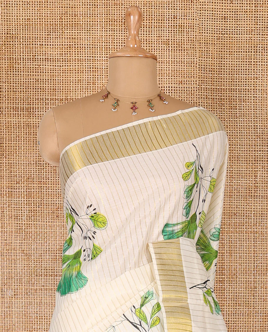 Cream and green vertically striped with handblock floral motifs printed Kerala cotton saree, zari striped border, handblock floral printed pallu, and a matching blouse - Image 3