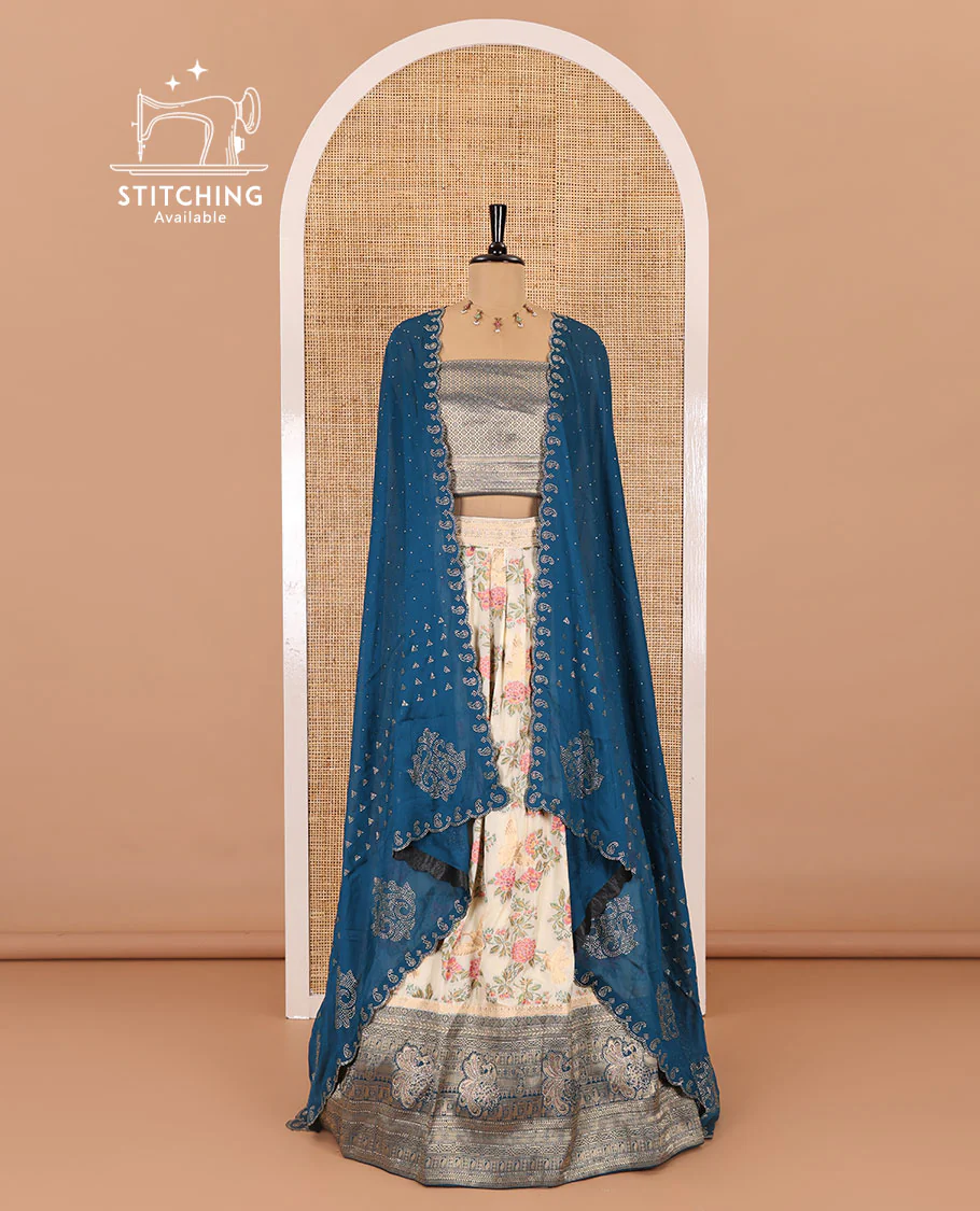 Cream and peacock blue half-saree, floral and bird printed nylon viscose crepe top, contrast traditional zari and stone work border, jacquard banaras blouse, and scallop stone work dhavani - Image 2
