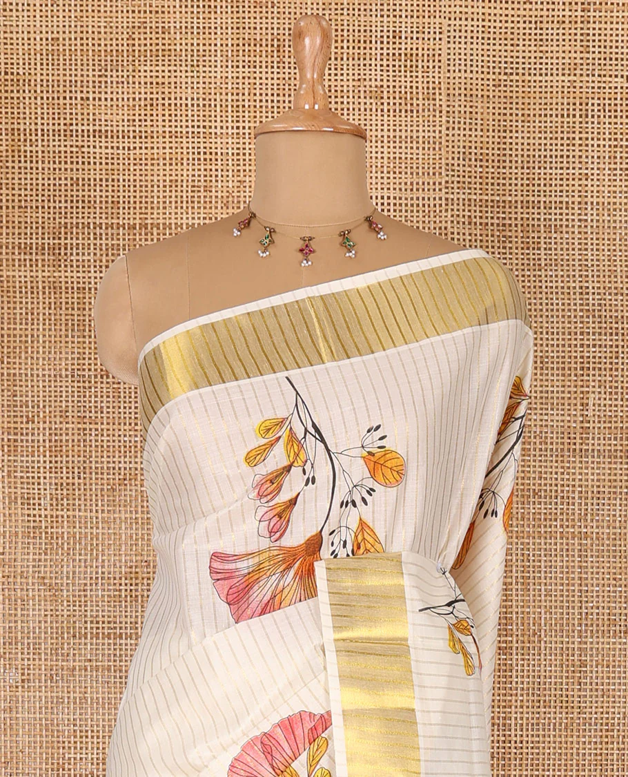 Cream and pink vertically striped with handblock floral motifs printed Kerala cotton saree, zari striped border, handblock floral printed pallu, and a matching blouse - Image 3