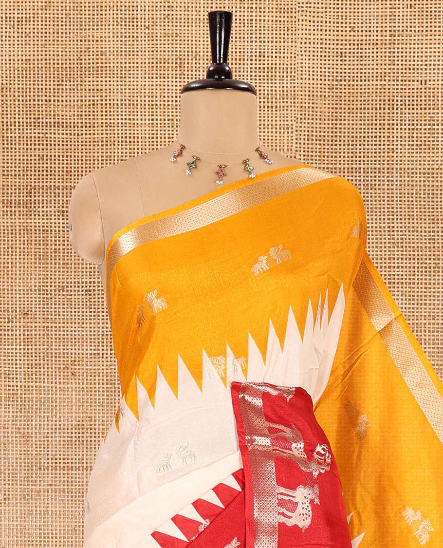 Cream deer zari motifs dola silk saree, contrast red-yellow ganga jamuna deer motifs zari woven border, paisley-diamond printed pallu, and a contrast deer motifs blouse - Image 2