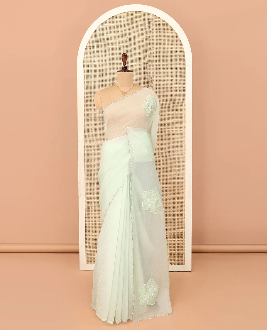 Cream five-petal flowers embroidered saree with scallop stone work border - Image 2