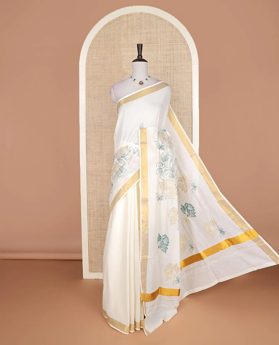 Cream floral, and paisley embroidered Kerala cotton saree, zari border, and floral, and paisley embroidered pallu