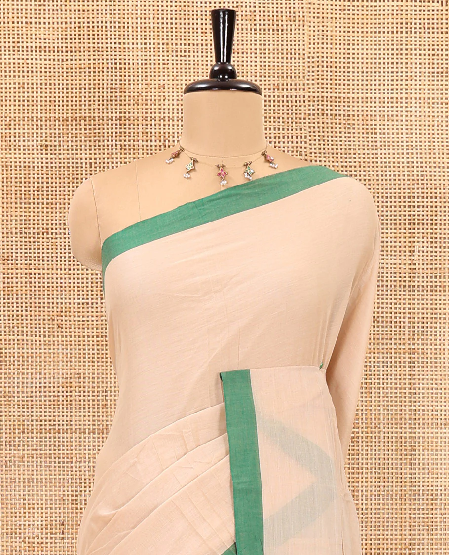 Cream-green plain mercerised cotton saree,contrast plain border, striped pallu, and a contrast plain blouse - Image 3