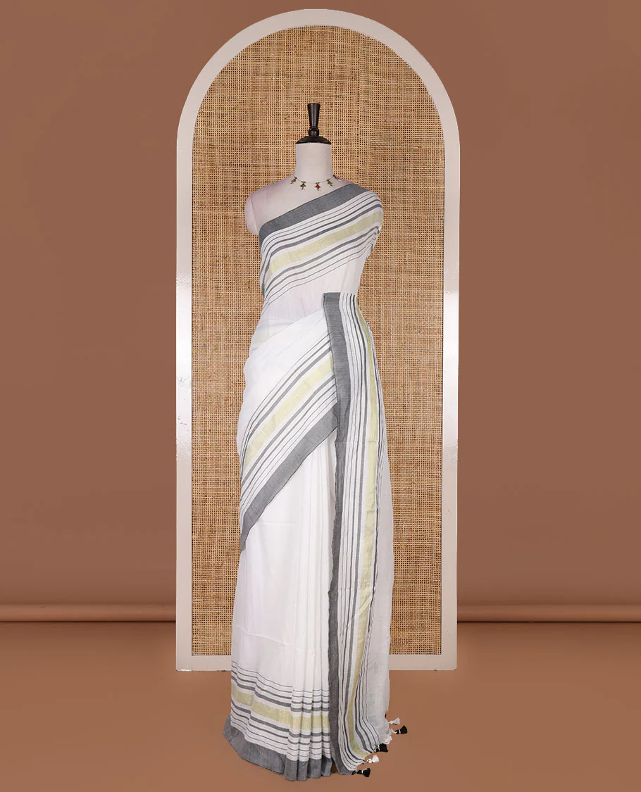 Cream-grey plain design mul mul cotton saree, contrast gold zari horizontally striped border, plain pallu, and plain blouse - Image 2