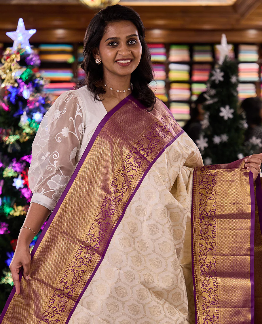 Cream jacquard silk saree, contrast vanasingaram style border of thilakam mokku, kodi visiry, mayil, maan, and yaanai designs, and intricate pallu - Image 2