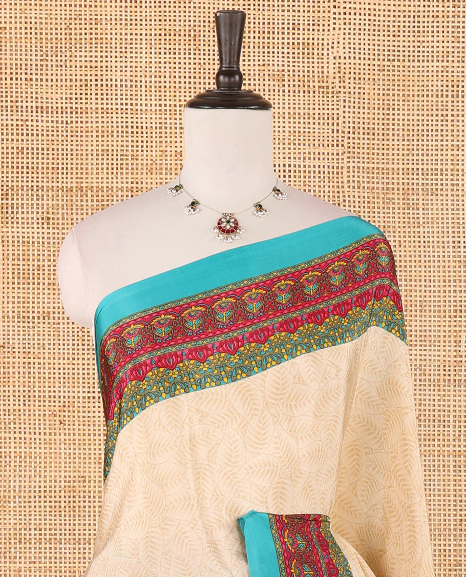 Cream leaf motifs printed crepe silk saree, contrast blue printed blouse, kaleidoscope coloured intricately printed border & pallu - Image 3