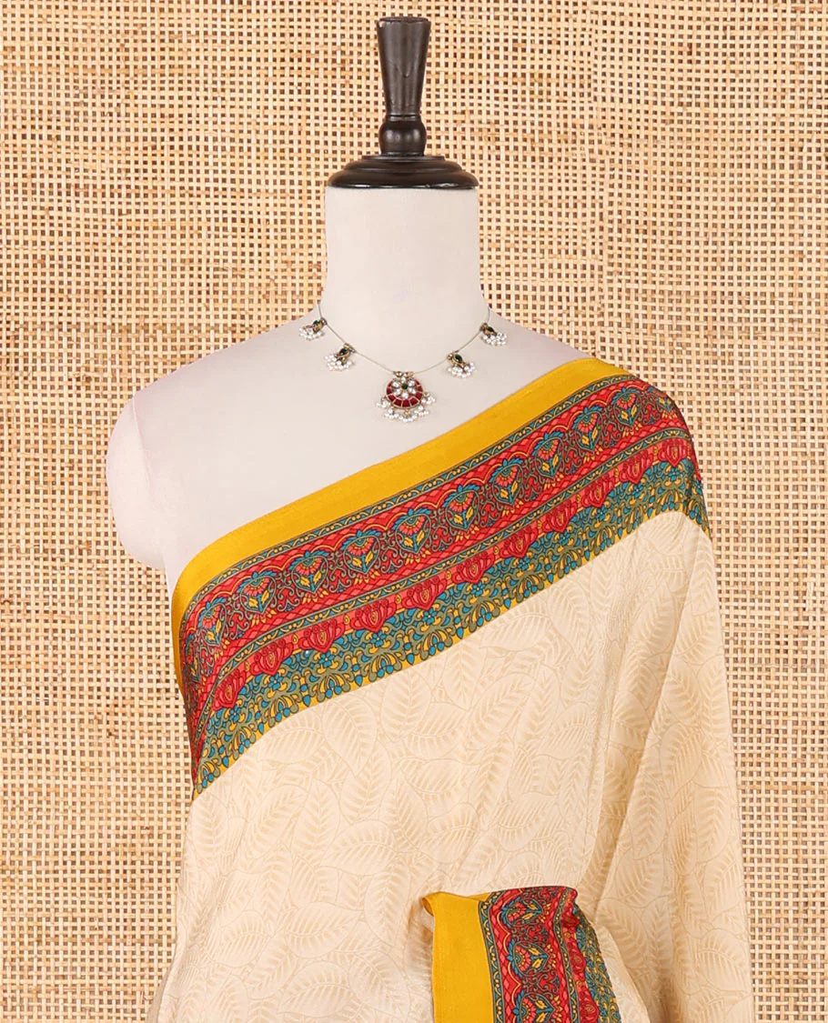 Cream leaf motifs printed crepe silk saree, contrast yellow printed blouse, kaleidoscope coloured intricately printed border & pallu - Image 3