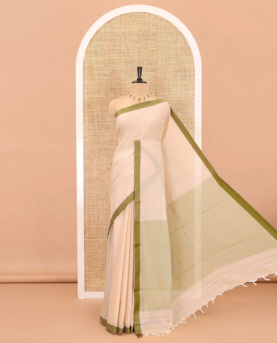 Cream-olive green plain mercerised cotton saree,contrast plain border, striped pallu, and a contrast plain blouse