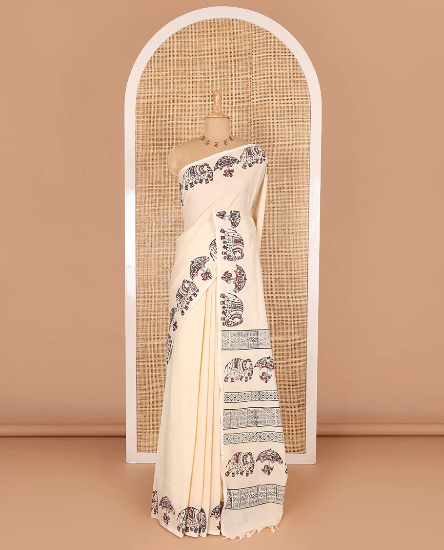 Cream plain South cotton saree, umbrella, and elephant motifs block printed border, block printed pallu, a matching blouse and a contrast floral vine block printed blouse - Image 2