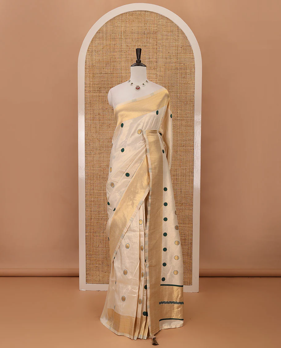 Cream small green polka dots banarasi tissue saree, zari border, pallu of green polka dots & running plain blouse - Image 2