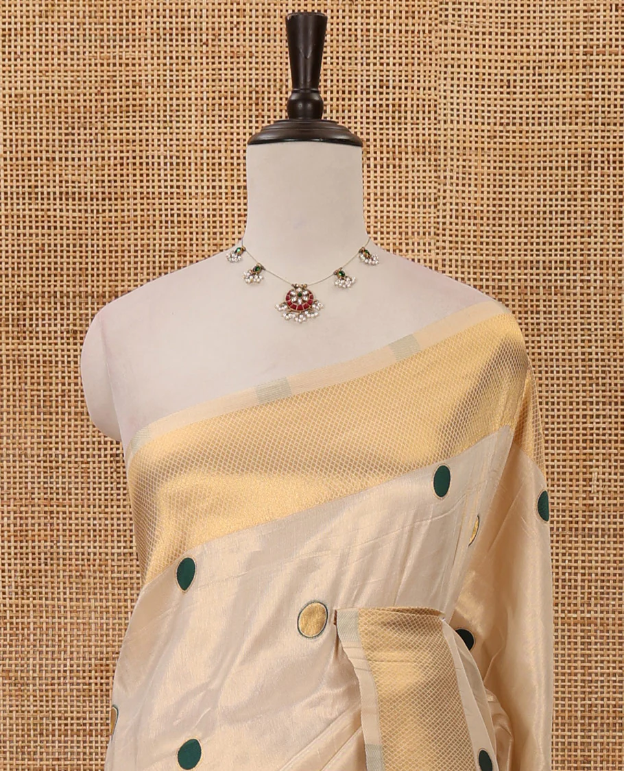 Cream small green polka dots banarasi tissue saree, zari border, pallu of green polka dots & running plain blouse - Image 3