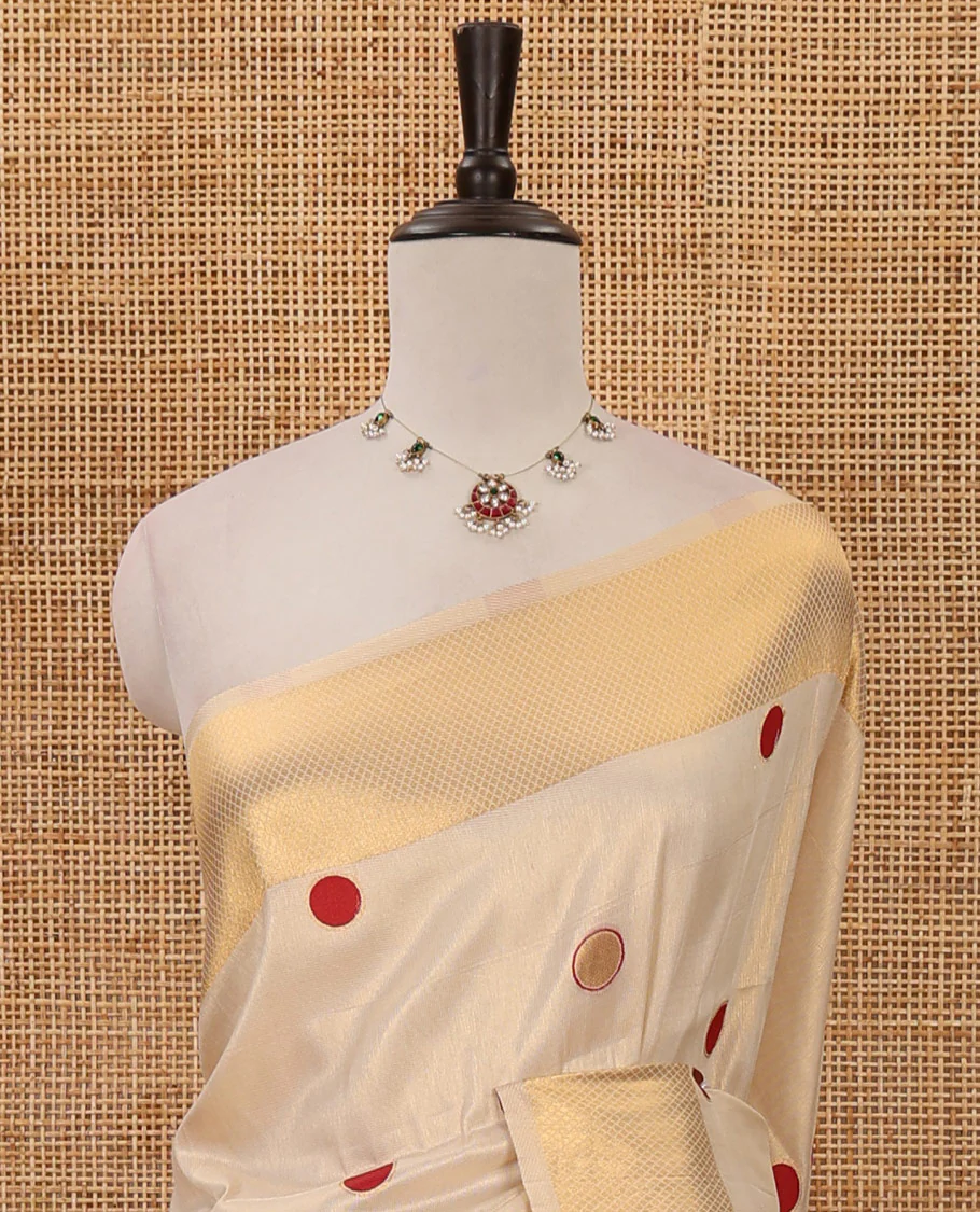 Cream small red polka dots banarasi tissue saree, zari border, pallu of red polka dots & running plain blouse - Image 3