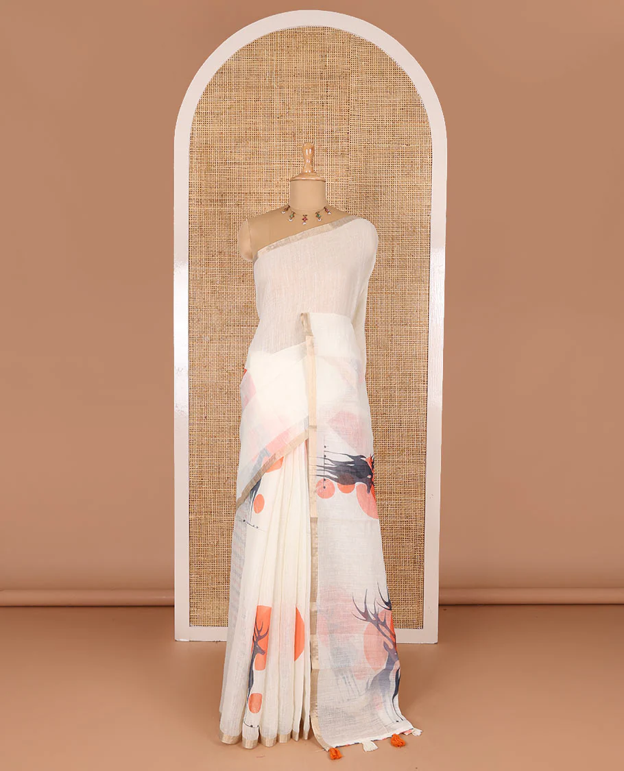 Cream sun and deer silhouette printed linen cotton saree, gold zari piping border, printed pallu, and a matching stripes printed blouse - Image 2