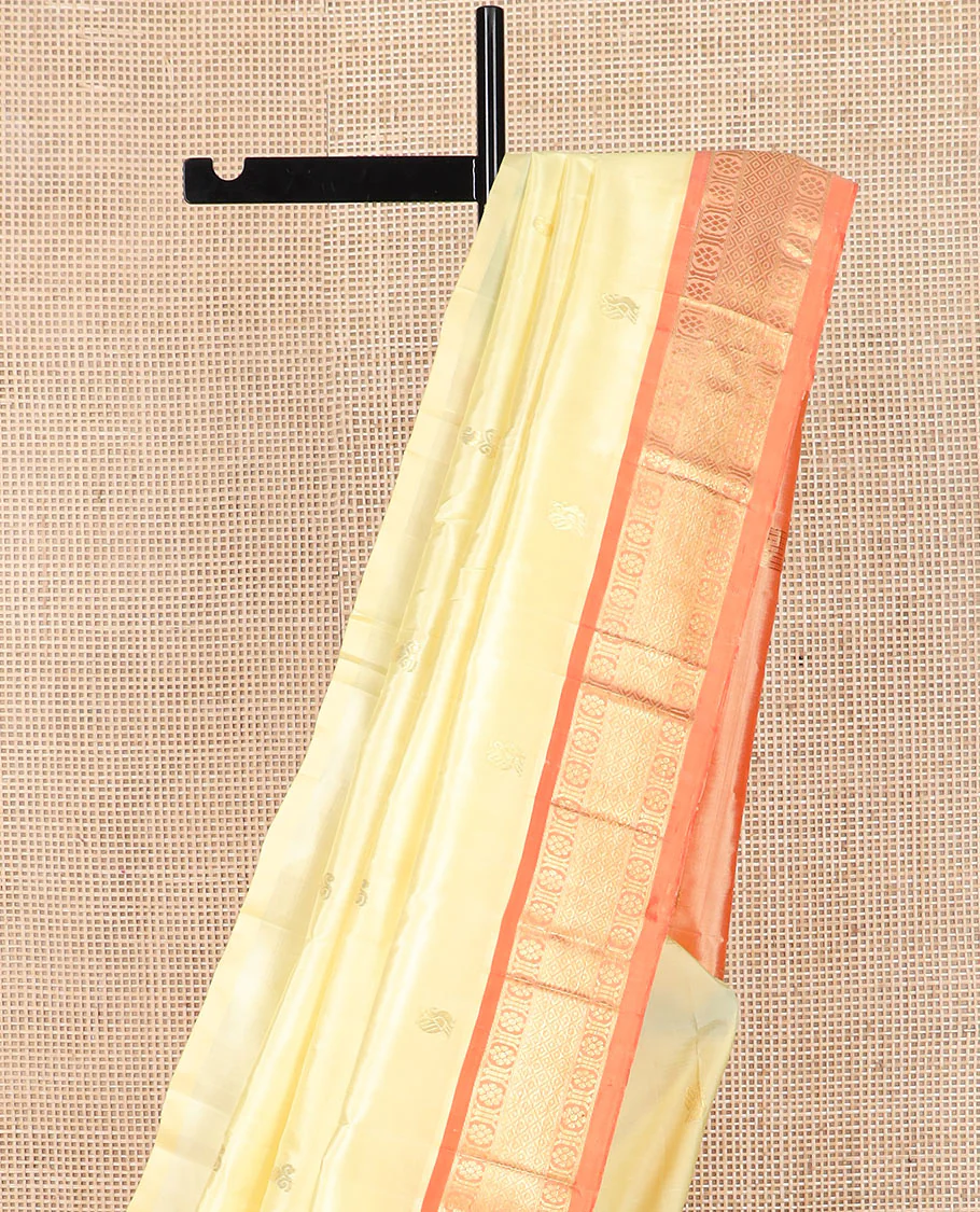 Cream zari buttas Kanchipuram silk saree, contrast one-sided border of banaras, chakram, and mayil kann designs, and zari design pallu - Image 3