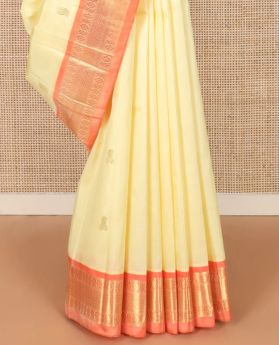 Cream zari buttas Kanchipuram silk saree, contrast one-sided border of banaras, chakram, and mayil kann designs, and zari design pallu - Image 4