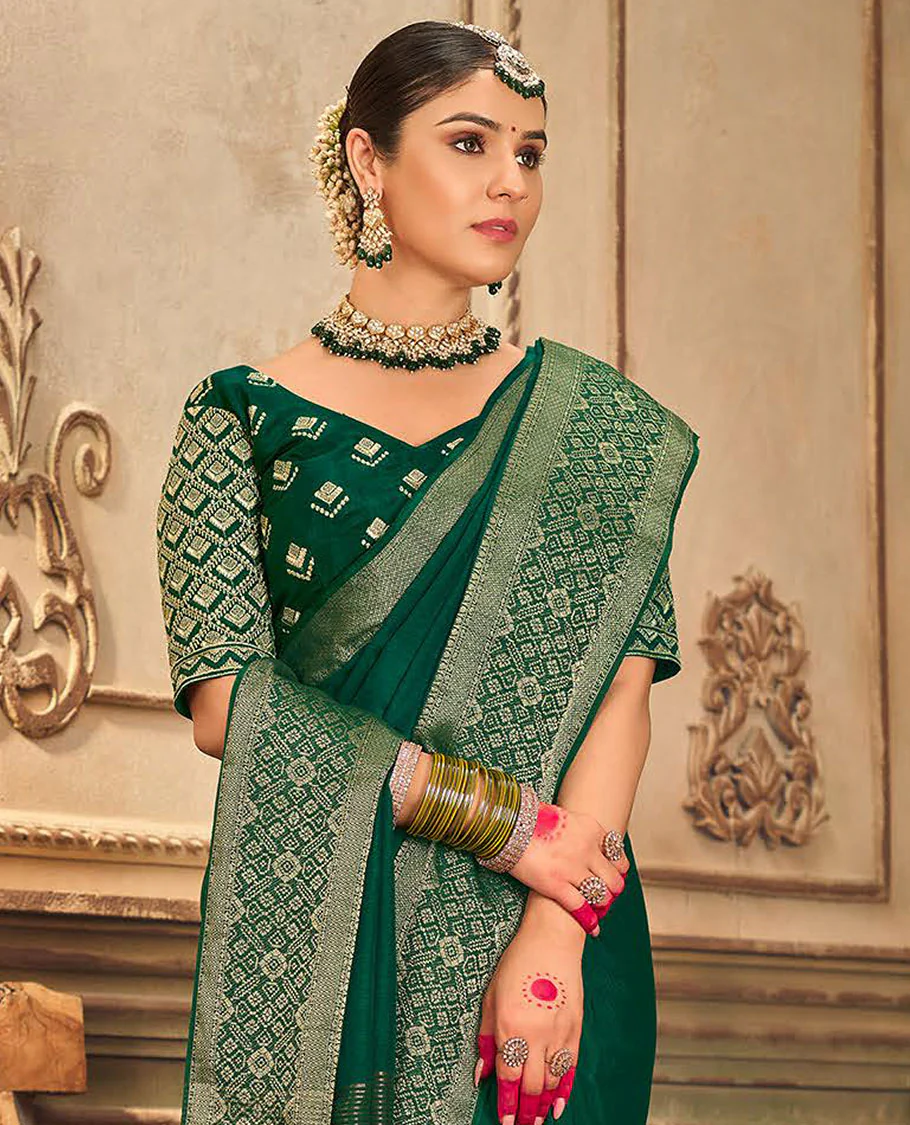Dark green plain designer saree, patola-style motifs woven border, and zari striped pallu - Image 2