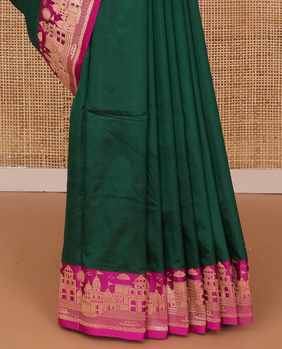 Dark green zari buttas katan silk saree, contrast Mughal style buildings featured border, and pallu mirroring the same border design - Image 4