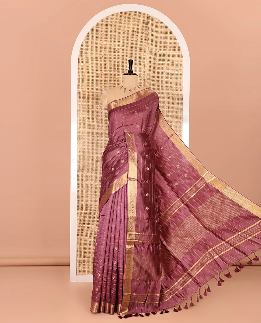 Dark onion zari buttas and striped banana pith saree, bavanji border, zari striped pallu, and a matching blouse
