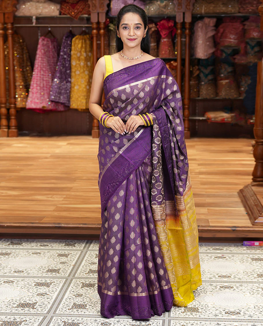 Dark Violet Semi-Tussar Saree Accentuated with Copper Zari Floral Bud Motifs, Featuring a Floral Creeper Embossed Border, Complemented by a Contrast Pallu Adorned with Floral Bud Motifs, and Paired with a Contrast Blouse