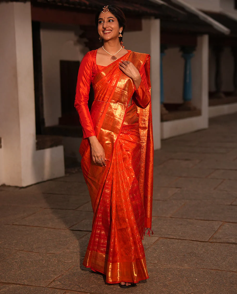 Dazzling Red Zari Butta Enclosed in a Checked Vasundhara silk saree, Zari Border of Kuthirai and Chakram Designs, and Intricately Zari-Woven Pallu - Image 3