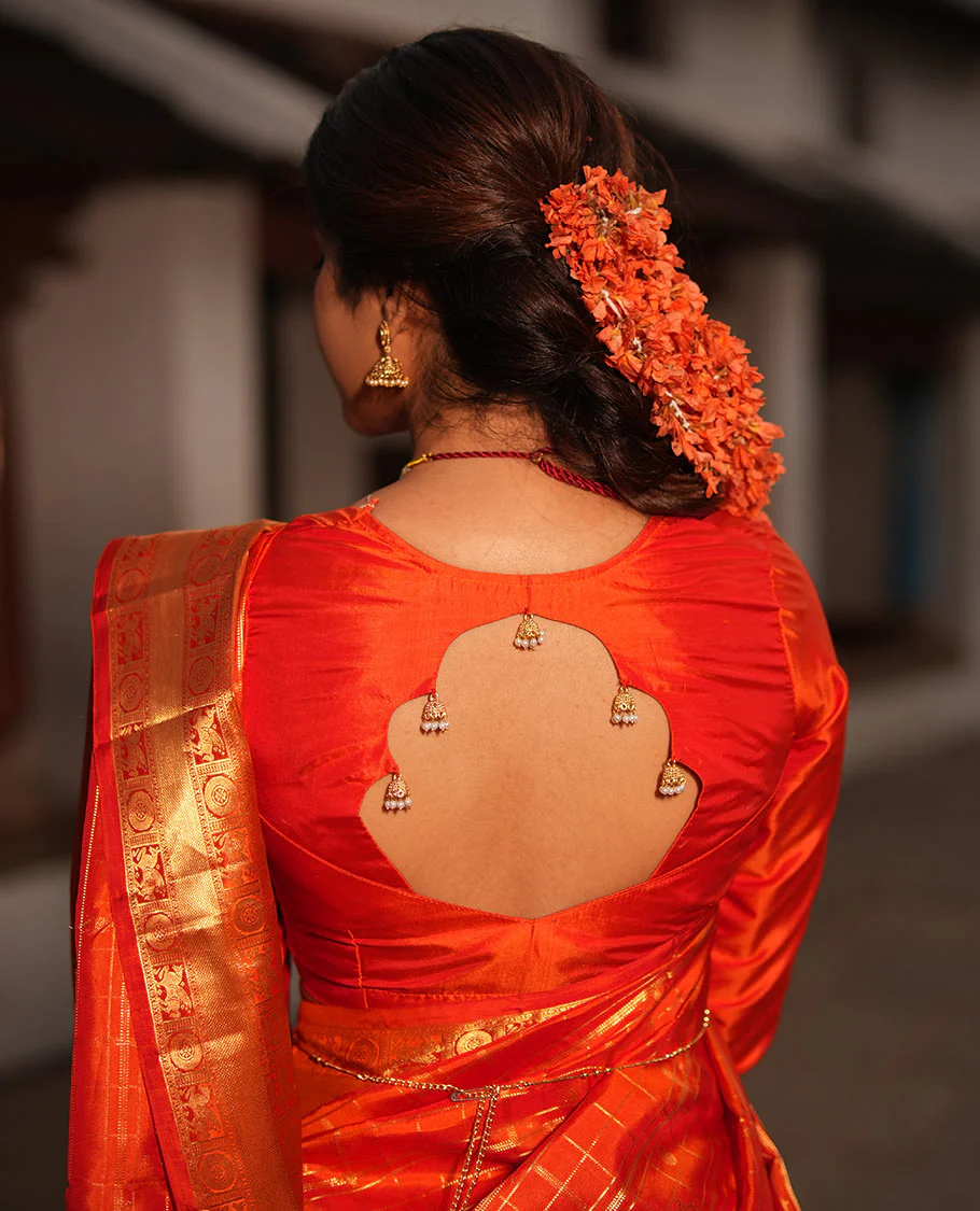 Dazzling Red Zari Butta Enclosed in a Checked Vasundhara silk saree, Zari Border of Kuthirai and Chakram Designs, and Intricately Zari-Woven Pallu - Image 5