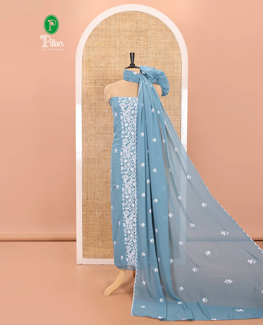 Ferozi Blue Material Chudidar Set Featuring Chikankari-Style Paisley Vine Design, Thread-Embroidered Georgette Top, Subtly Made Plain Santoon Material Bottom, and a Floral Motifs-Embroidered Georgette Scallop-Bordered Dupatta