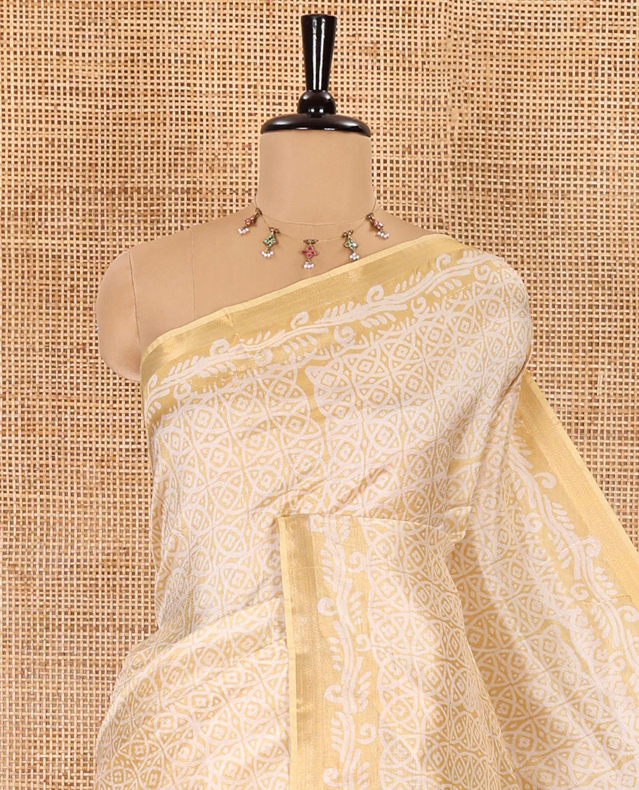Gold geometric batik printed banana pith saree, printed piping border, paisley motifs steeped pallu, and a matching blouse - Image 2