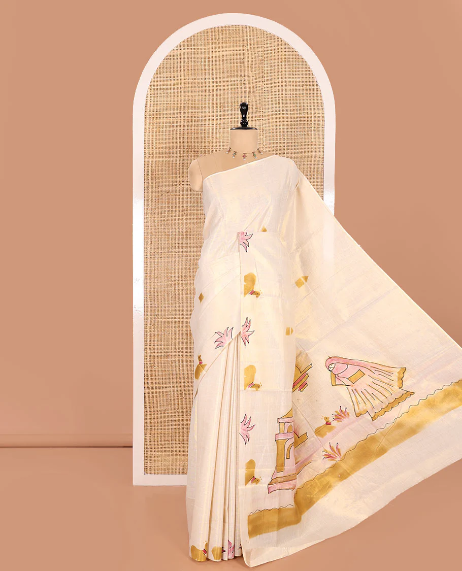 Gold-Mustard Kerala Cotton Saree Subtly Sparked with Handblock-Printed Flora-Fauna-Architecture Motifs, Featuring a Self Pallu with Matching Flora-Fauna-Architecture Handblock Prints, Paired with a Matching Plain Blouse.