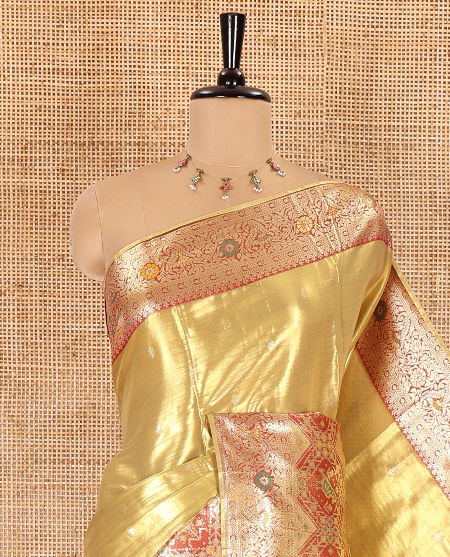 Gold zari buttas tissue silk saree, contrast border of patola design and traditional motifs, jaal pallu, and a matching blouse - Image 2