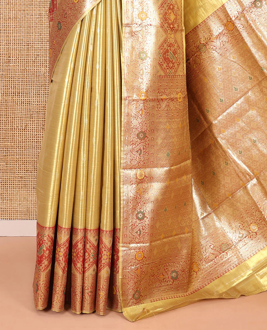 Gold zari buttas tissue silk saree, contrast border of patola design and traditional motifs, jaal pallu, and a matching blouse - Image 3