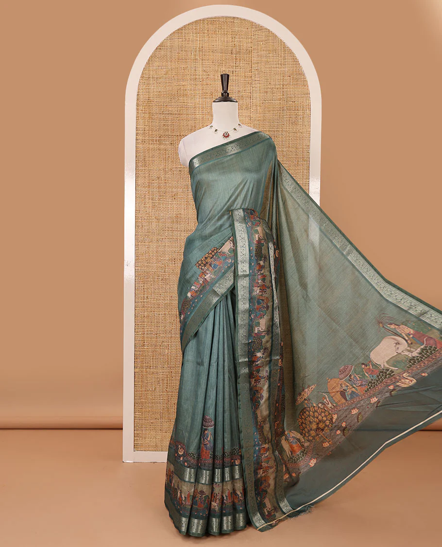 Green ancient human printed semi-tussar saree, traditional zari and ancient human motifs printed border, printed pallu & running blouse
