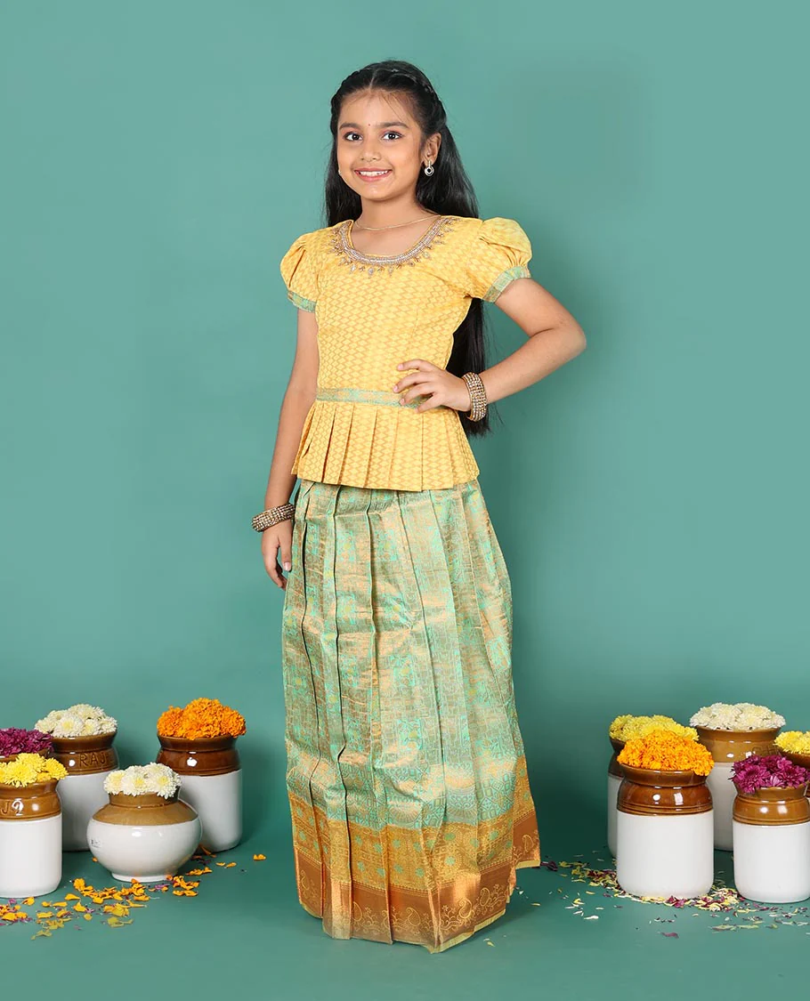 Green art silk readymade pavadai set, jacquard with contrast traditional zari border skirt, and contrast round neck embroidered puff-sleeve blouse - Image 2