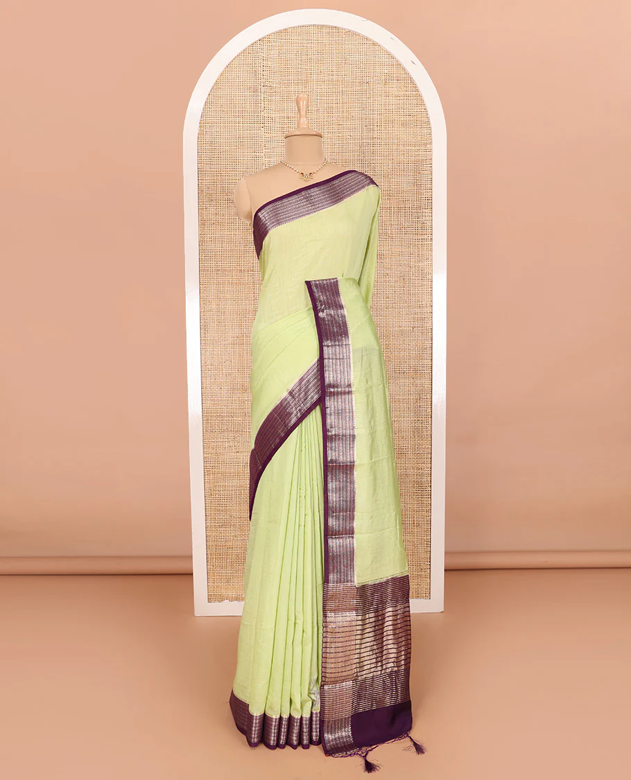 Green Assam Silk Saree Features Sparsely Woven Buttas, Complemented by Contrast Traditional Zari Design Border, Pallu Elevated with Zari Stripes, and Paired with a Contrast Blouse - Image 2