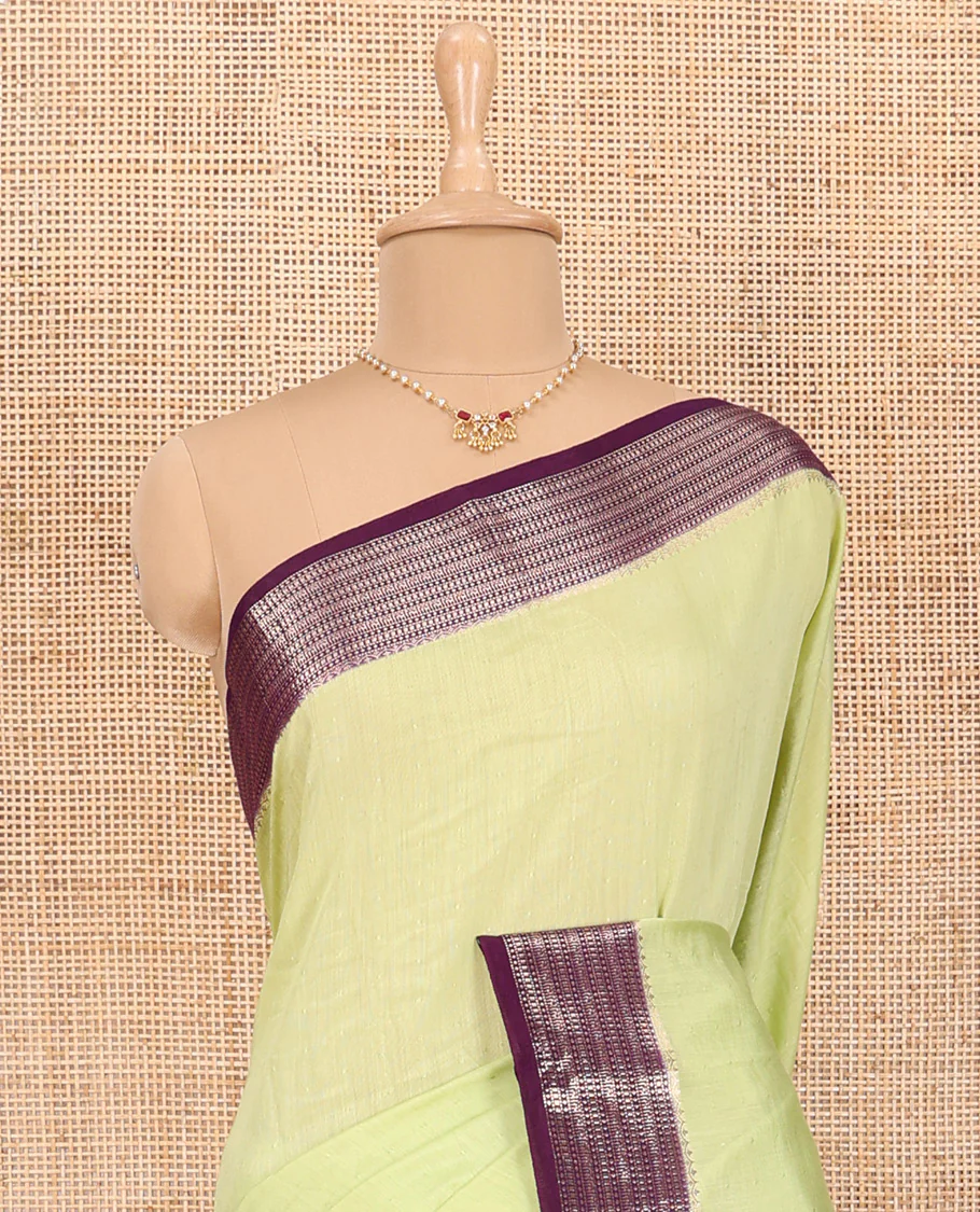 Green Assam Silk Saree Features Sparsely Woven Buttas, Complemented by Contrast Traditional Zari Design Border, Pallu Elevated with Zari Stripes, and Paired with a Contrast Blouse - Image 3