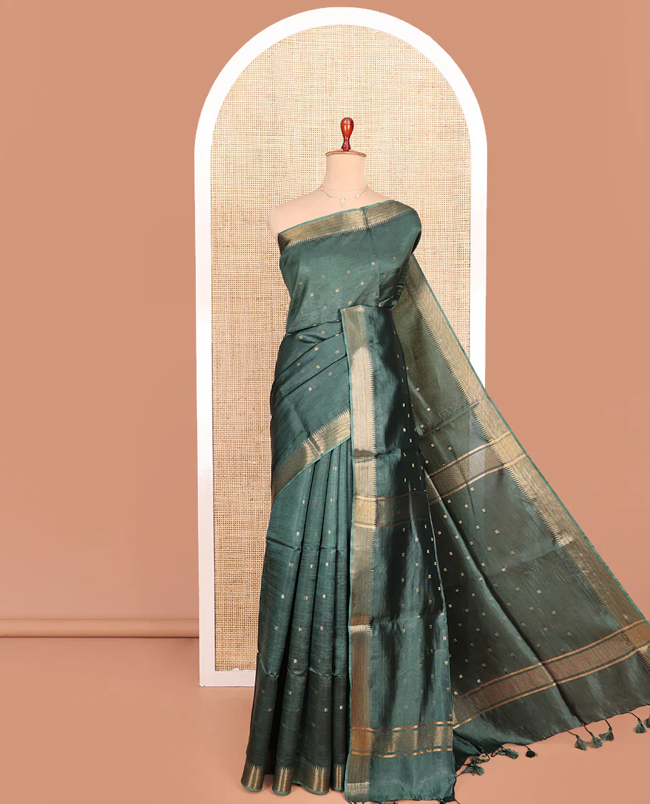 Green Banana Pith Saree Accentuated with Zari Buttas, Temple Border of Zari Designs, Subtle Pallu of Zari Designs, and Paired with a Matching Blouse