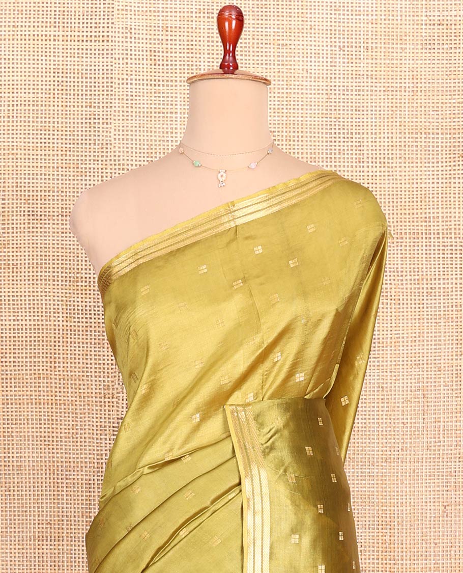 Green Banana Pith Saree Gracefully Embellished with Square-Shaped Zari Buttas, Subtly Woven Zari Piping Border, Pallu Gleamed Up with Zari Stripes, and Paired with a Matching Blouse - Image 2