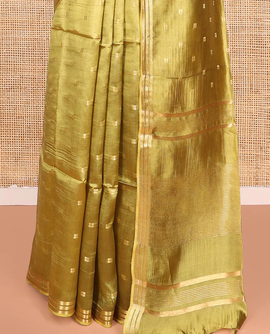 Green Banana Pith Saree Gracefully Embellished with Square-Shaped Zari Buttas, Subtly Woven Zari Piping Border, Pallu Gleamed Up with Zari Stripes, and Paired with a Matching Blouse - Image 4